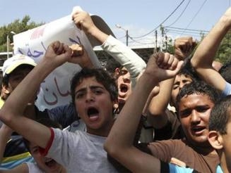 مدارس السويس تقف دقيقة حداد على أرواح أطفال اسيوط و شهداء غزة