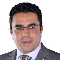 باسل عادل للإخوان: إذا اردتم الدخول إلى الميدان فليكن على اجسادنا”