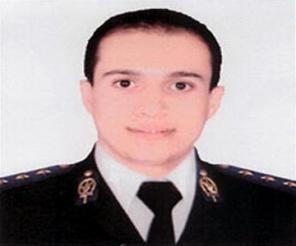 مسيرة حزينة للشرطيين لتسلم جثمان الضابط الشهيدمن مستشفى المنيا الجامعي