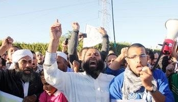 الأمن يطلق الغاز لمنع اقتحام مدينة الإنتاج الإعلامي