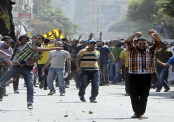 عاجل :معارك  بين الأهالي والإخوان بملوي