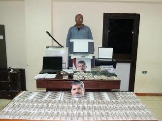 ضبط أخطر مزوري الصعيد يزور العملات والأوراق الرسمية