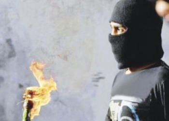 ملثمون يحرقون جزء من نقطة شرطة عين شمس