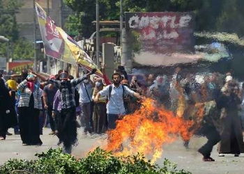 حرق نقطة العمرانية وأعلام داعش في مظارهرات بالجيزة