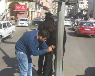 عادة تخطيط الشوارع الرئيسية وإصلاح الإشارات الضوئية المعطلة في أحياء مدينة بورسعيد المختلفة