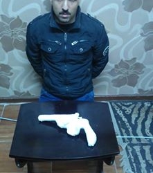 ضبط متهم بحوزته سلاح نارى 