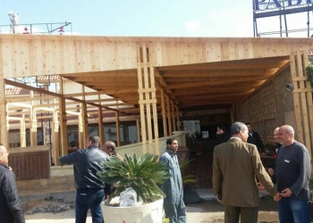 حي وسط في الأسكندرية يزيل التعديات على أملاك الدول بالحديقة الدولية