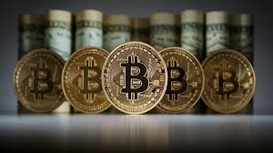 الـ ” بيتكوين ” تلامس سقف الـ 53 ألف دولار .. لأول مرة