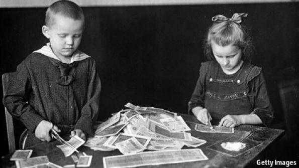 Two children near money