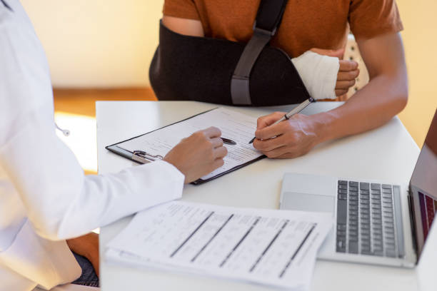 Insurance paperwork being reviewed with a pen