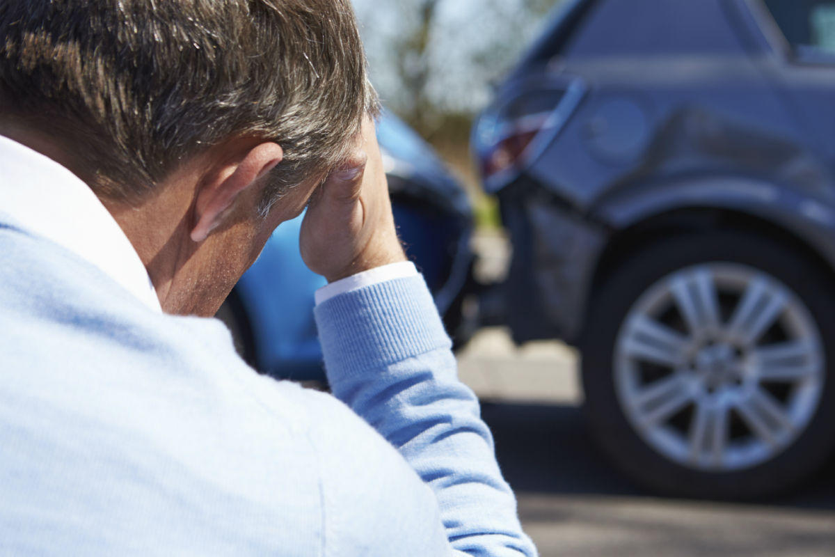 Person taking notes about a roadway incident