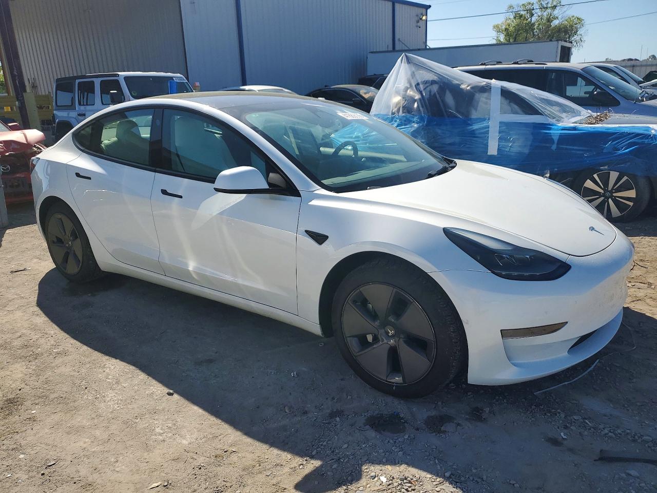 2023 TESLA MODEL 3 photo 4