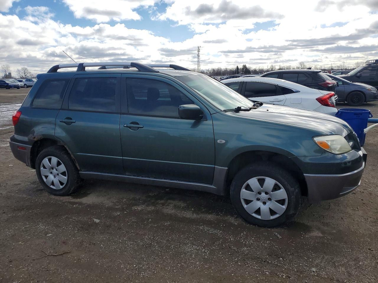 2005 MITSUBISHI OUTLANDER LS photo 4