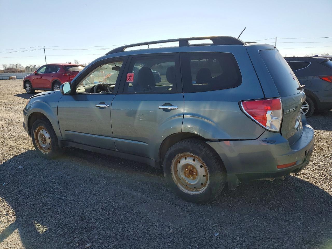 2010 SUBARU FORESTER photo 3