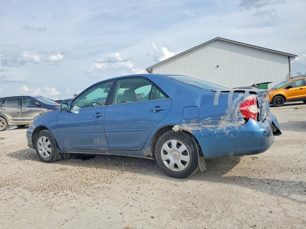 2004 TOYOTA CAMRY LE photo 4