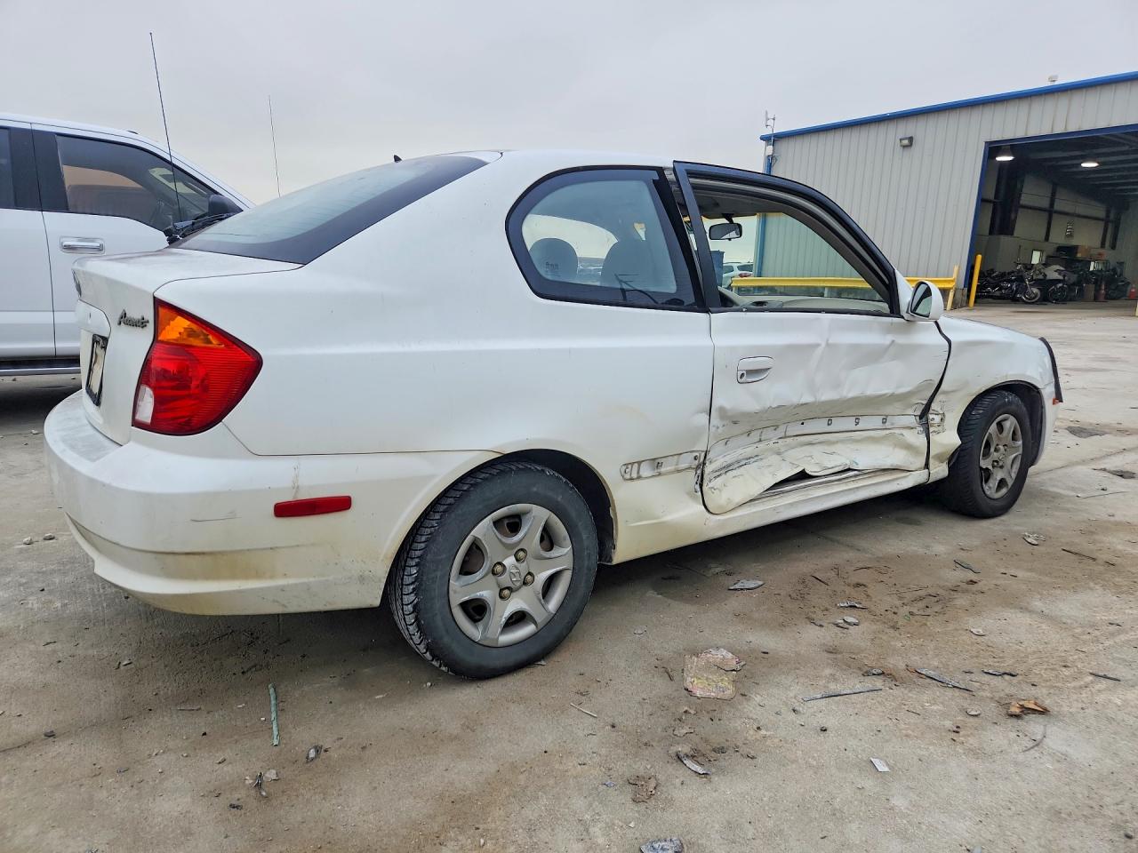 2003 HYUNDAI ACCENT GL photo 5