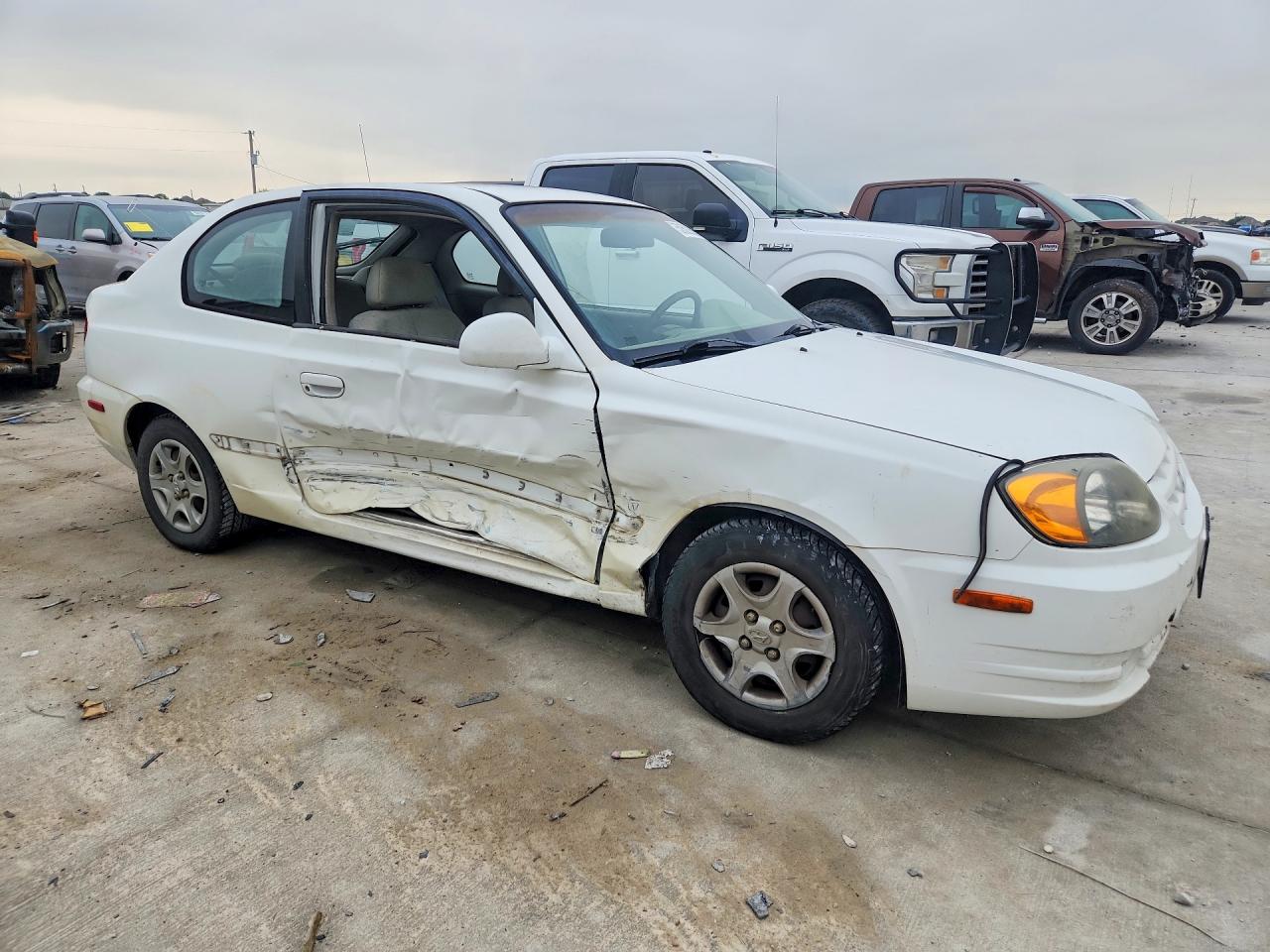 2003 HYUNDAI ACCENT GL photo 7