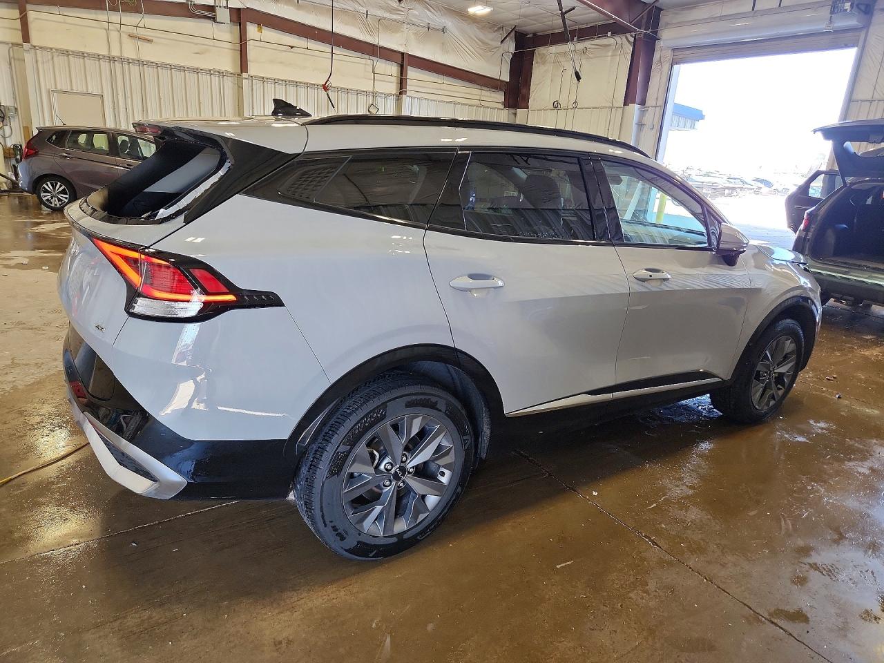 2023 KIA SPORTAGE SX photo 7