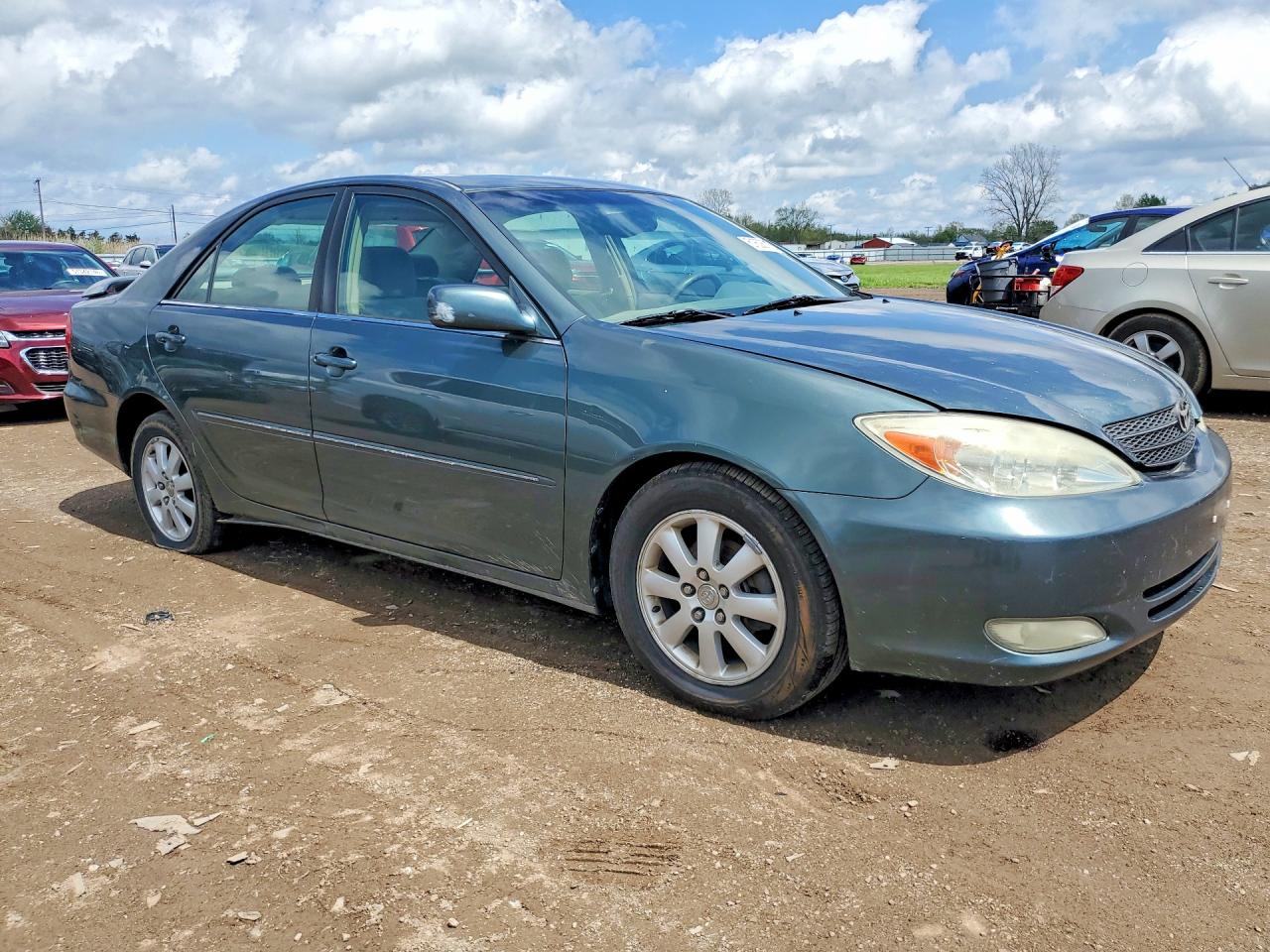 2004 TOYOTA CAMRY XLE photo 10