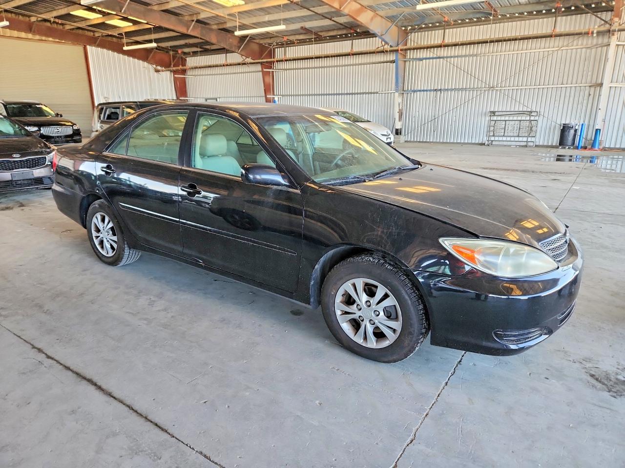 2004 TOYOTA CAMRY photo 10