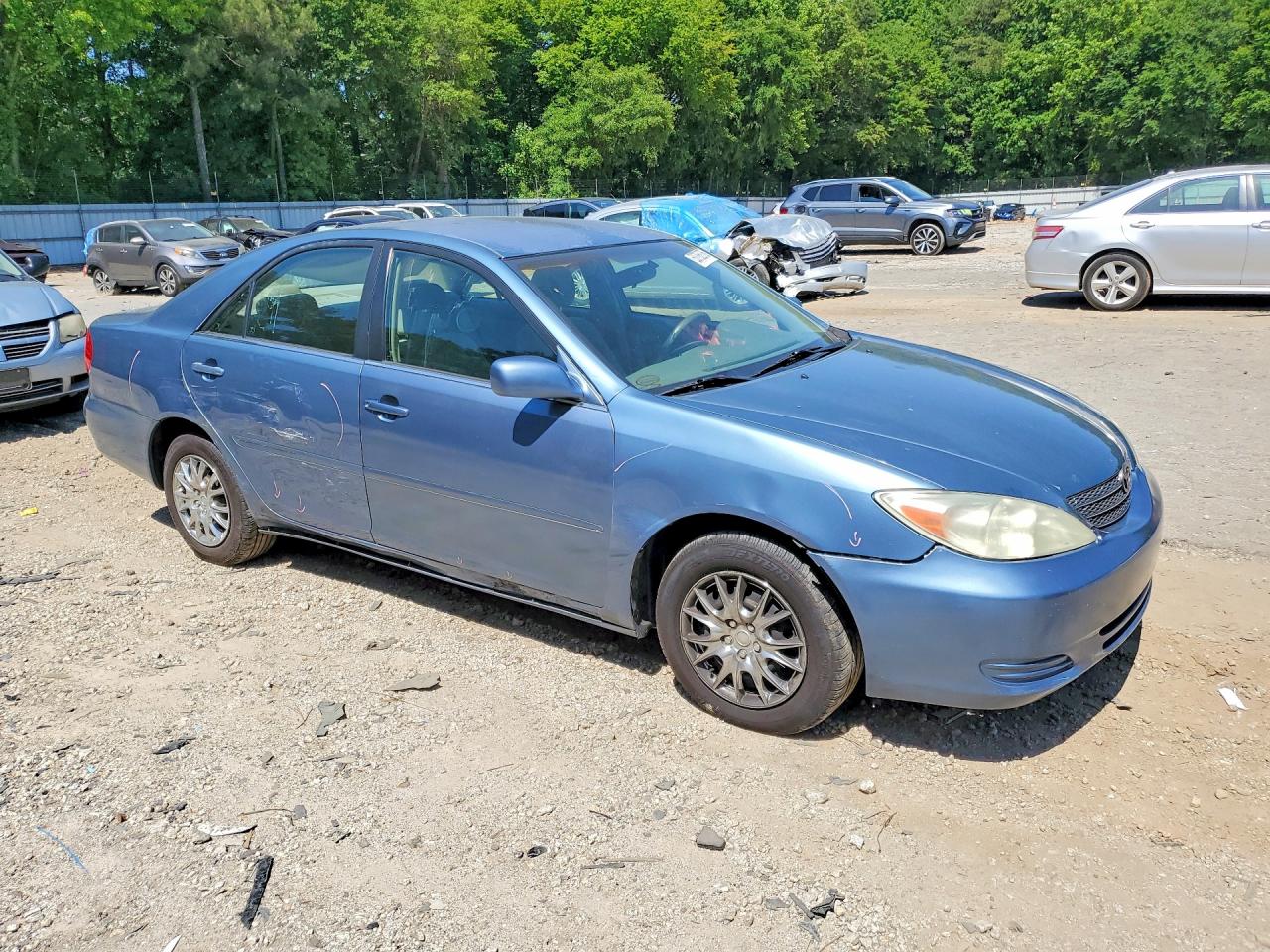 2004 TOYOTA CAMRY LE photo 4