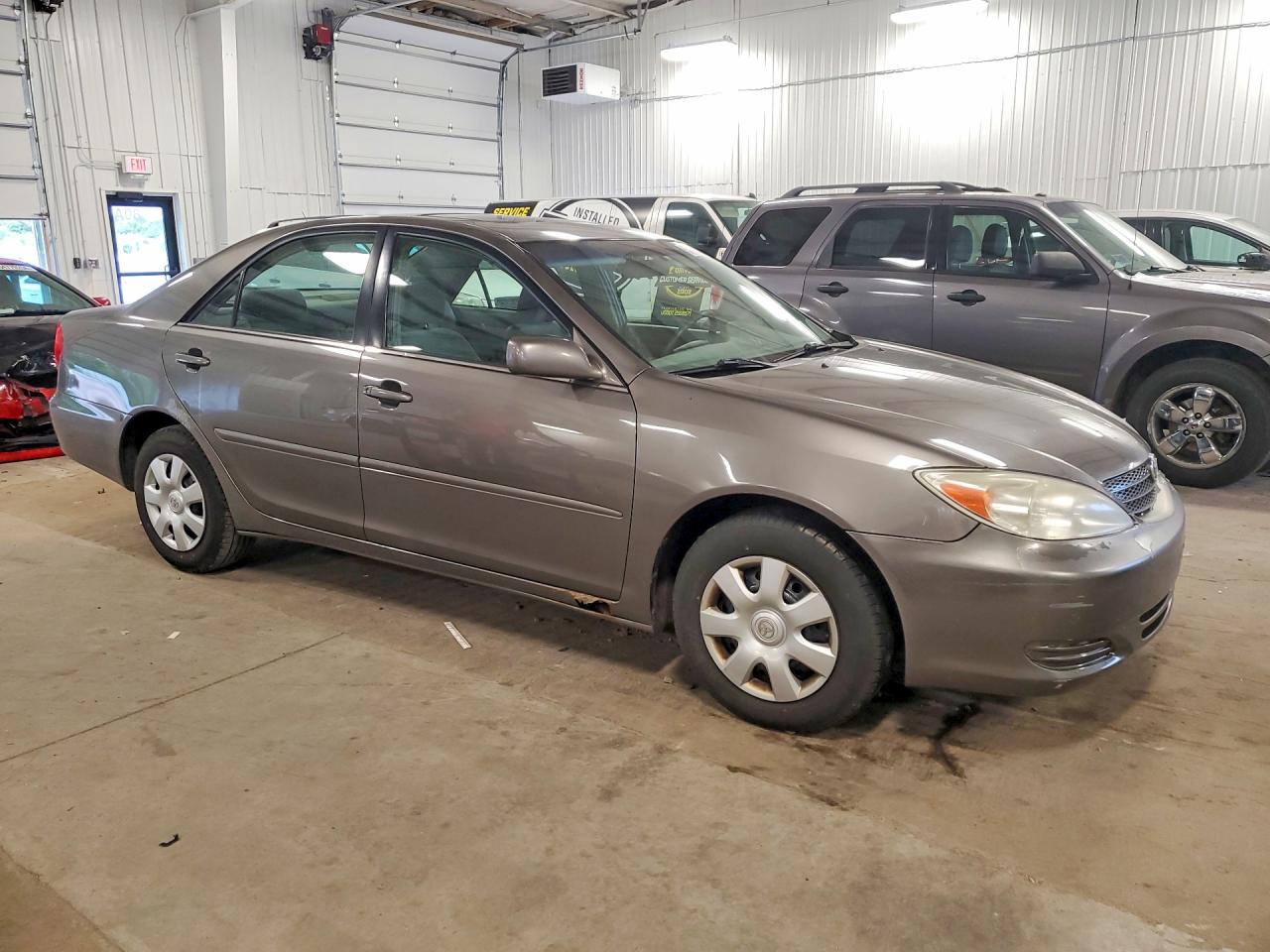 2002 TOYOTA CAMRY LE photo 7