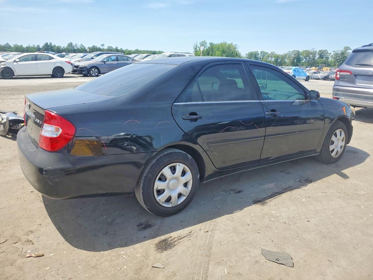 2004 TOYOTA CAMRY LE photo 5