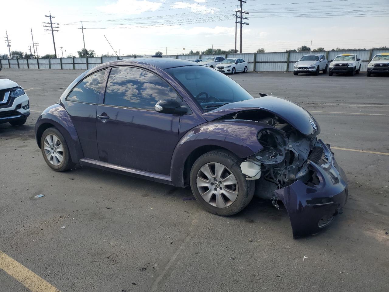 2009 VOLKSWAGEN NEW BEETLE S photo 4