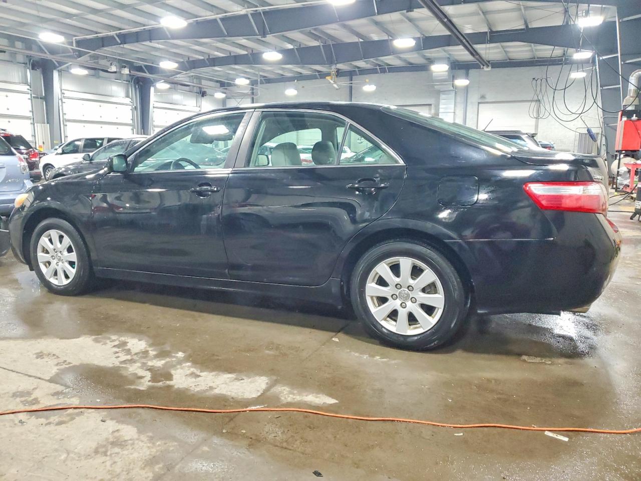 2009 TOYOTA CAMRY SE photo 4