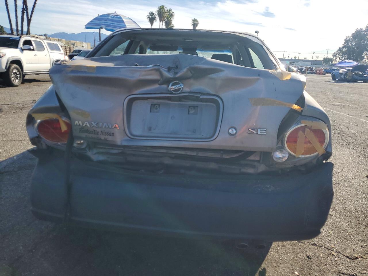 2003 NISSAN MAXIMA GLE photo 11