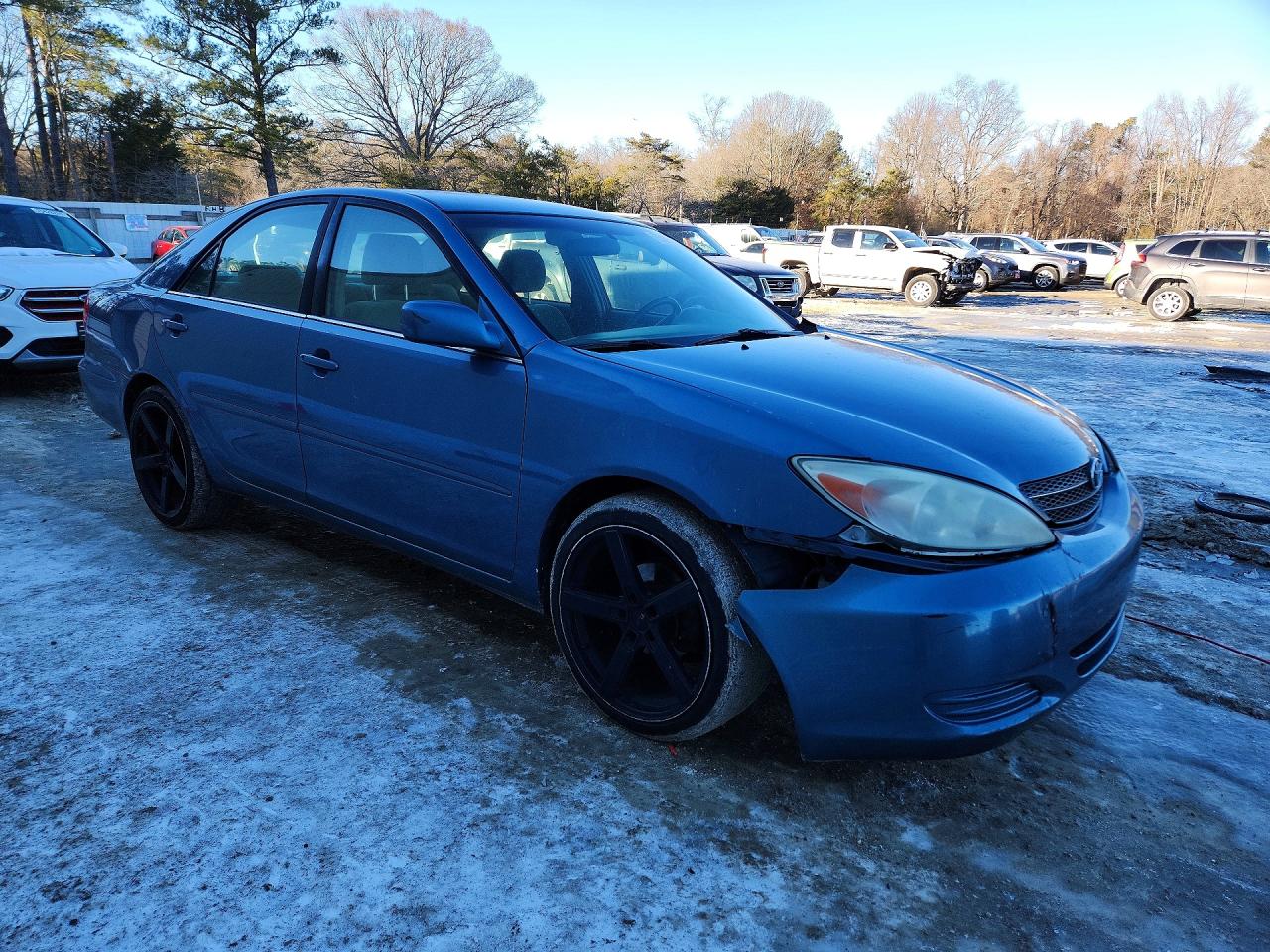 2004 TOYOTA CAMRY LE photo 4
