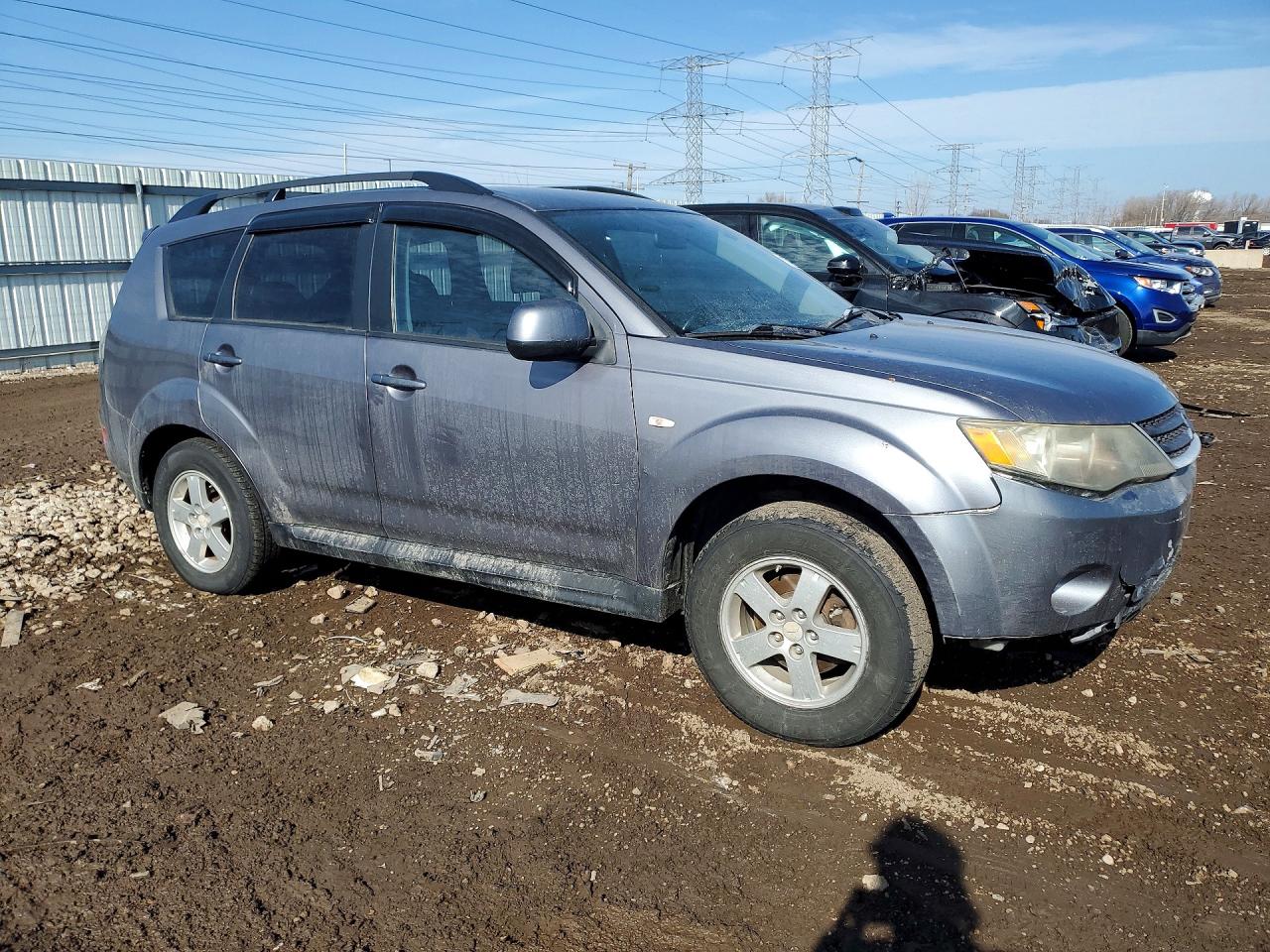 2009 MITSUBISHI OUTLANDER ES photo 4
