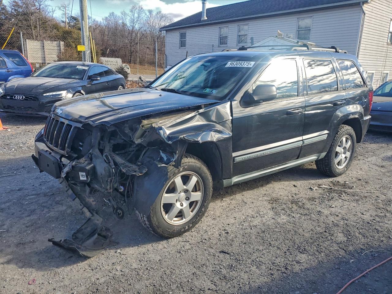 2009 JEEP GRAND CHEROKEE LAREDO — FRONT END damage — photo 1