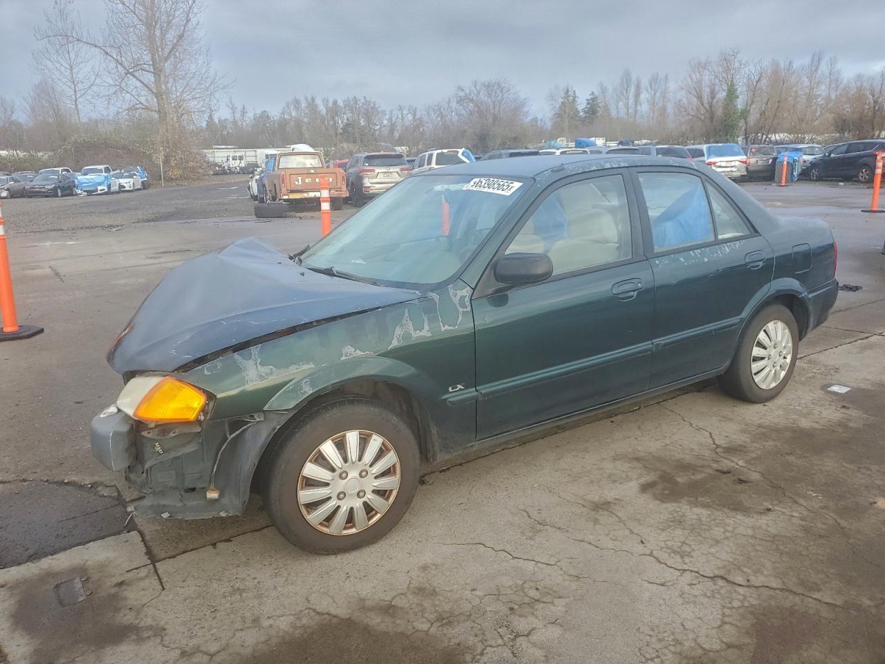 2000 MAZDA PROTEGE DX — FRONT END damage — photo 1
