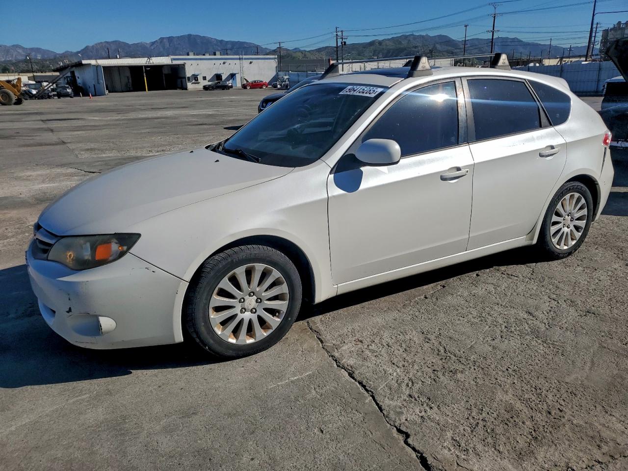2010 SUBARU IMPREZA 2.5I PREMIUM — FRONT END damage — photo 1