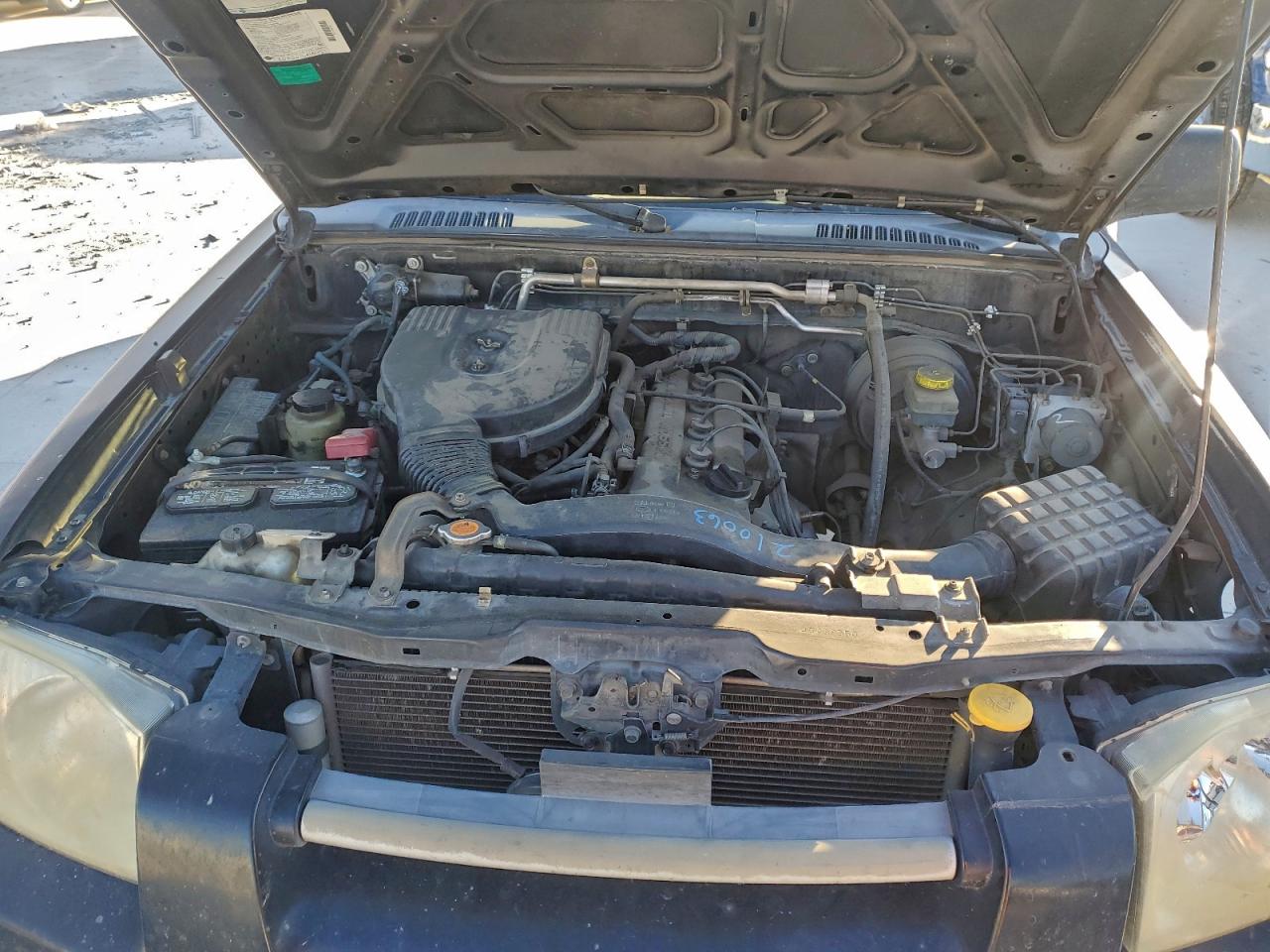 2004 NISSAN FRONTIER KING CAB XE photo 11