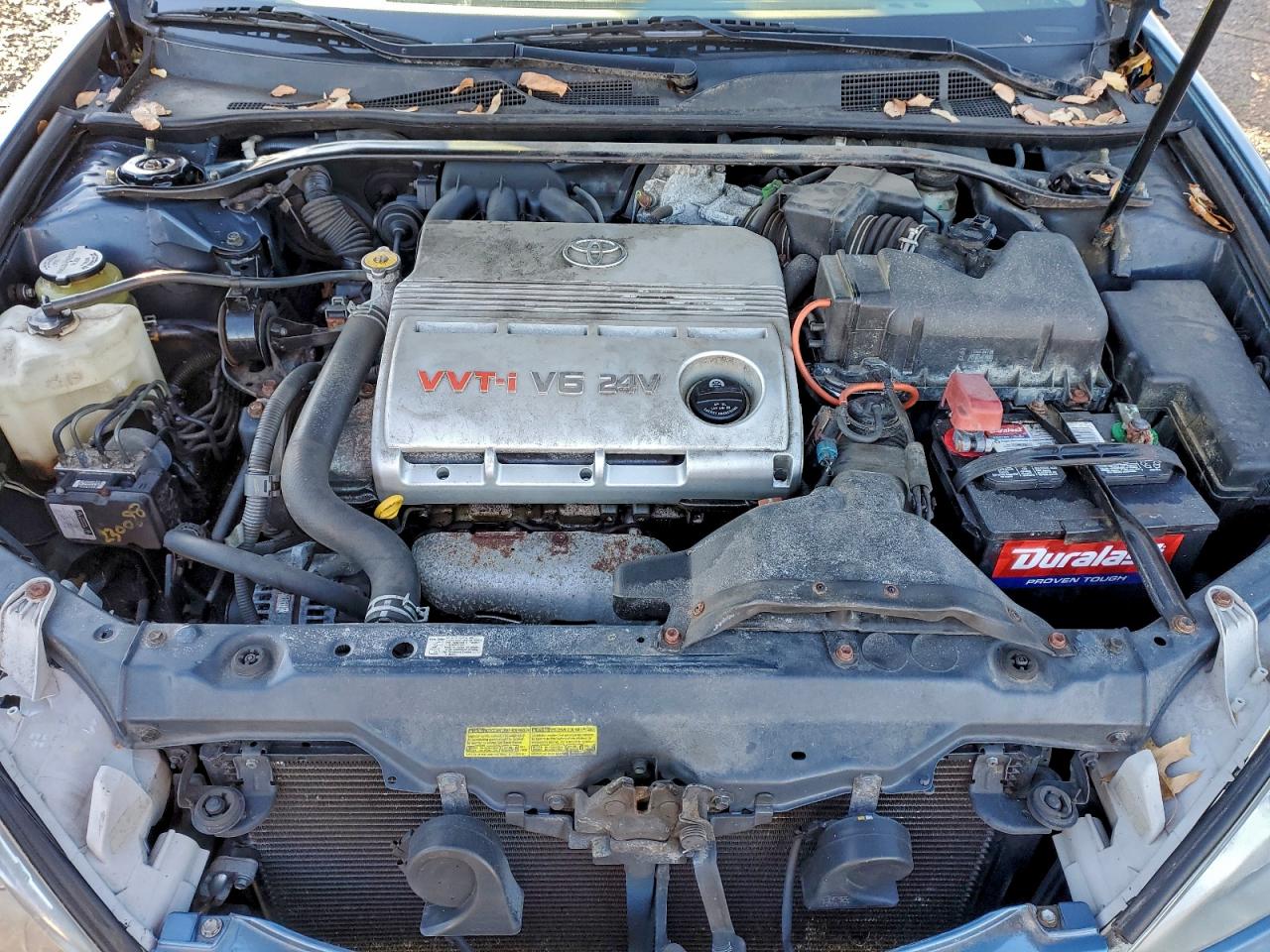 2004 TOYOTA CAMRY LE photo 11