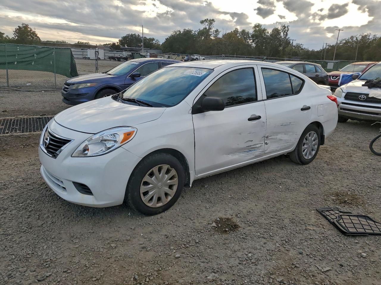 2014 NISSAN VERSA S — SIDE damage — photo 1