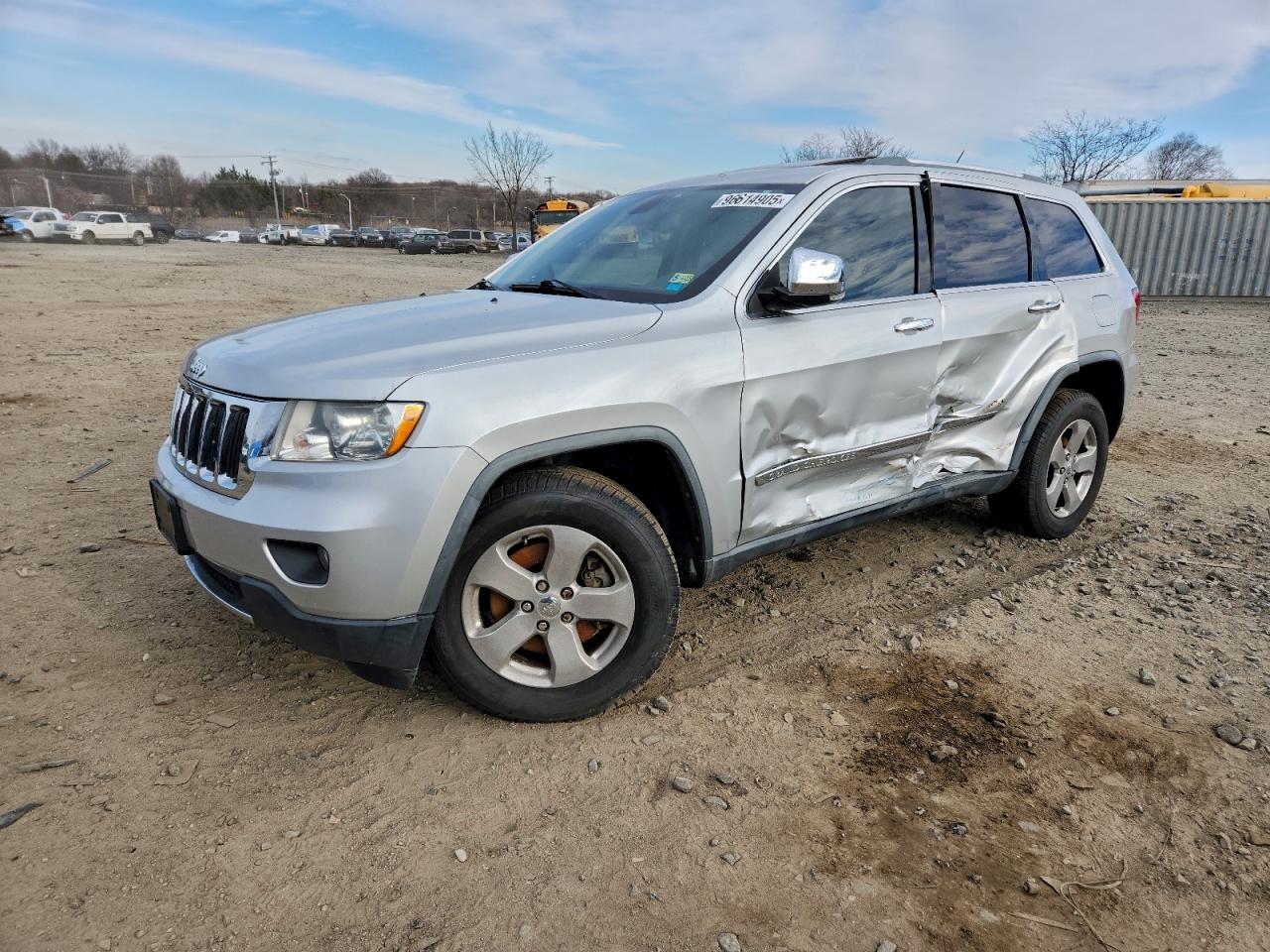 2011 JEEP GRAND CHEROKEE LIMITED — SIDE damage — photo 1