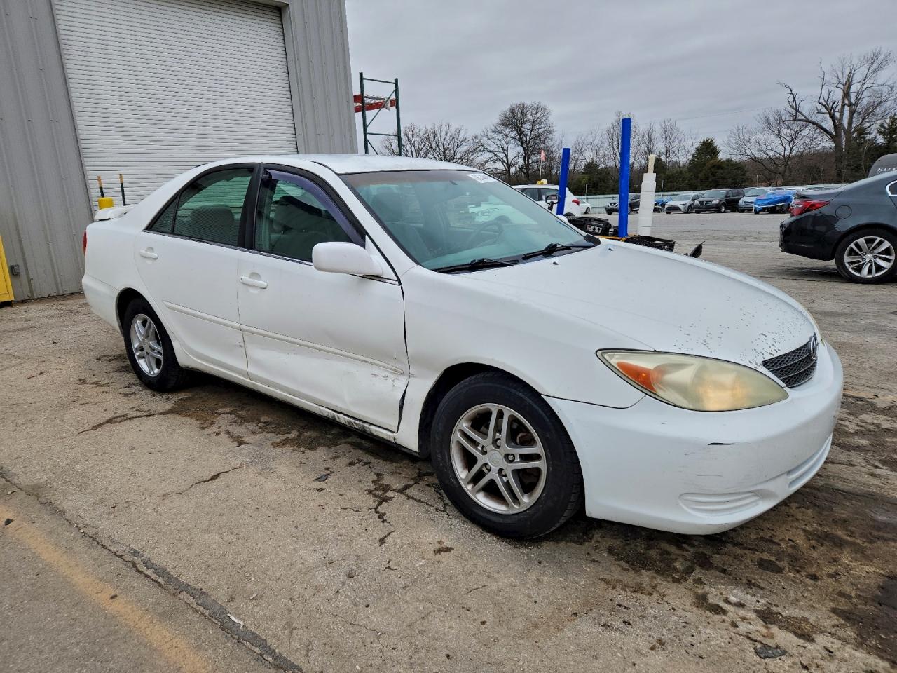 2004 TOYOTA CAMRY LE photo 4