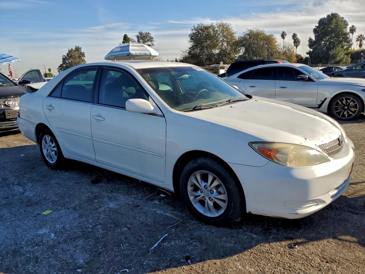 2004 TOYOTA CAMRY LE photo 4