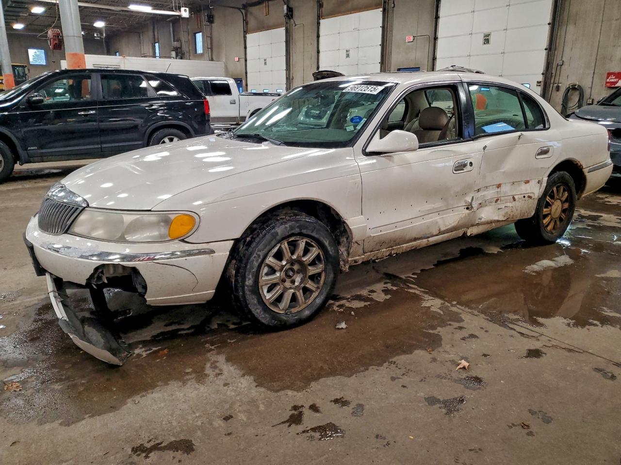 2000 LINCOLN CONTINENTAL — FRONT END damage — photo 1