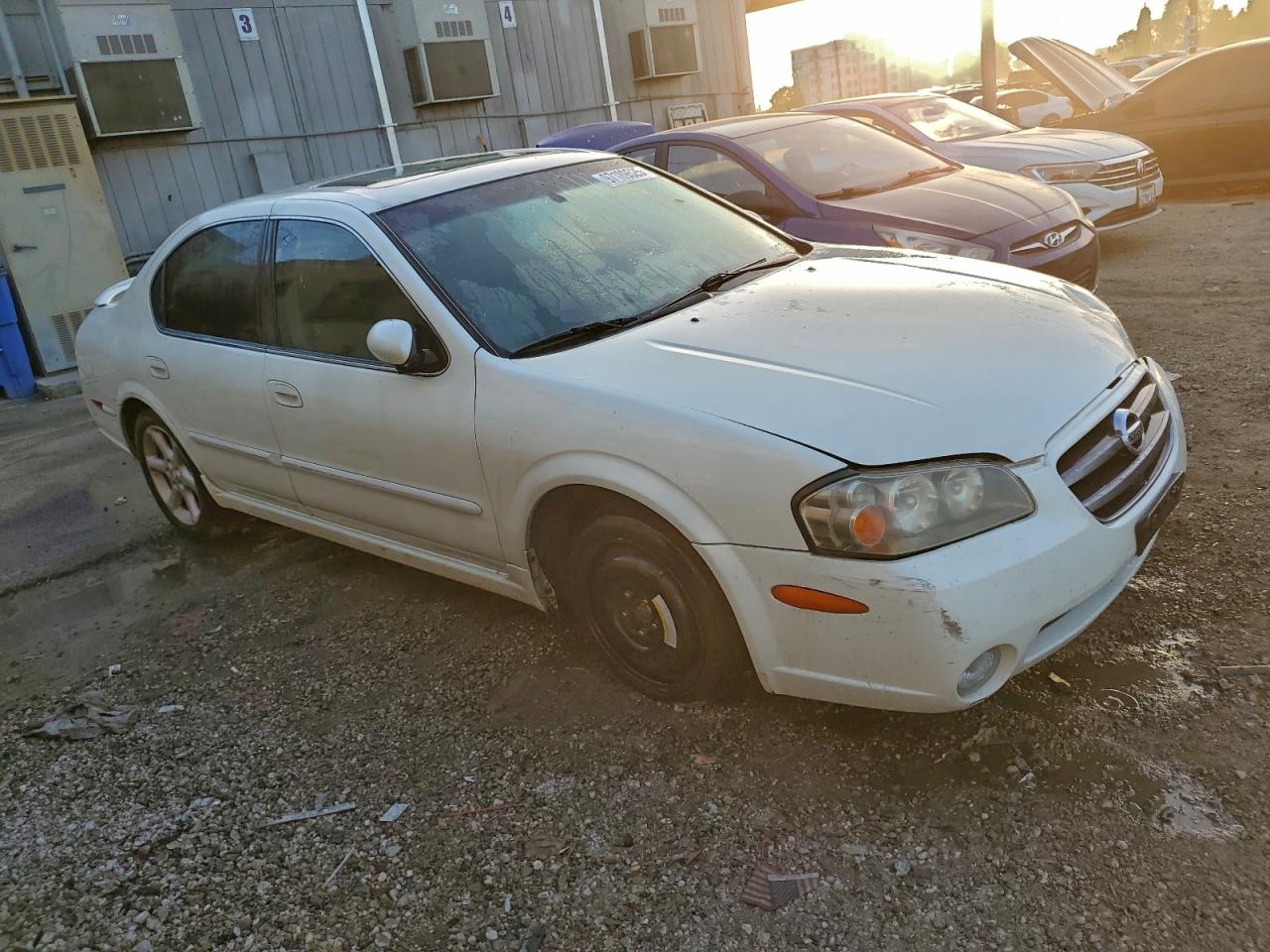 2003 NISSAN MAXIMA GLE photo 4