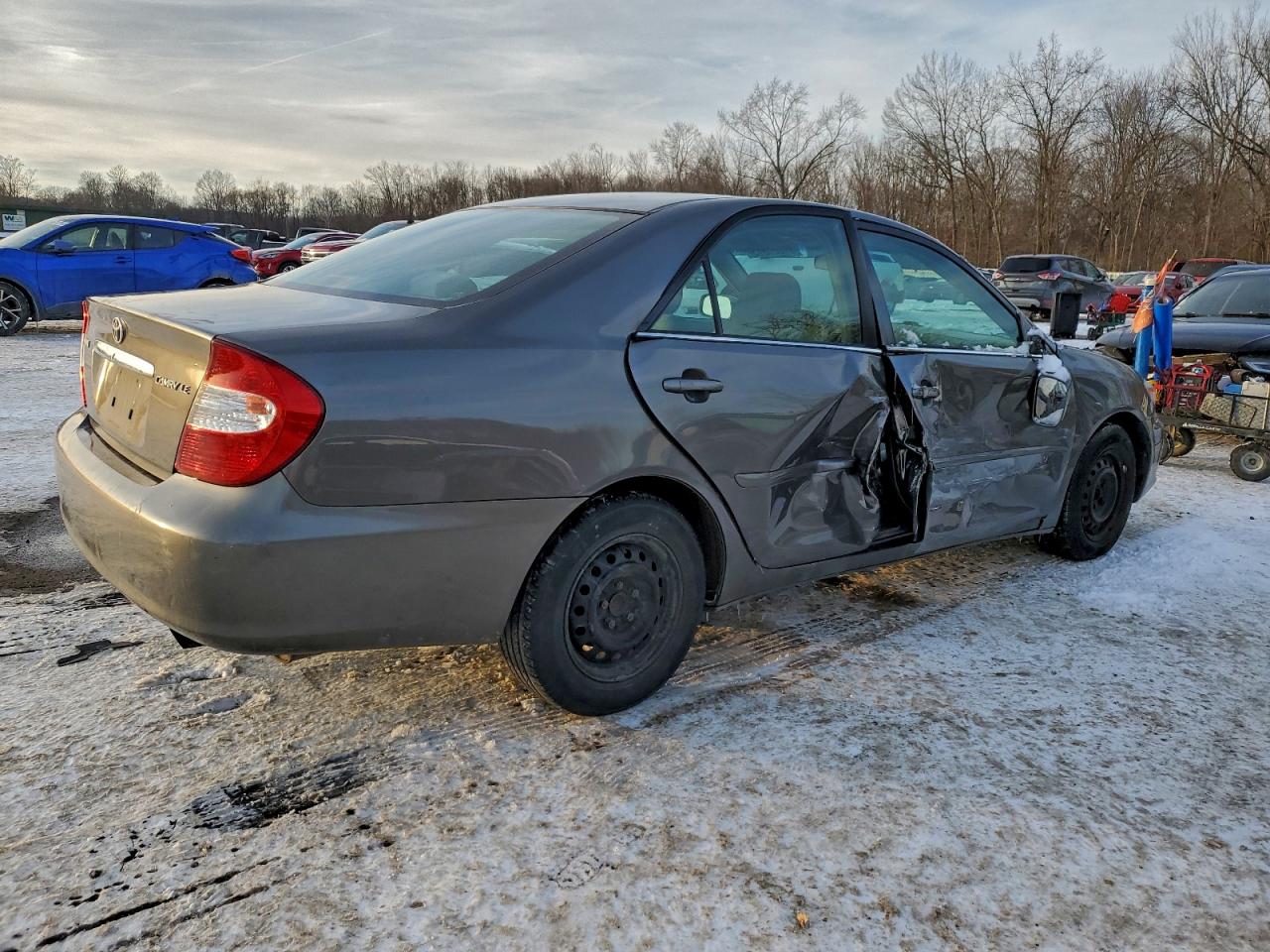 2004 TOYOTA CAMRY LE photo 5