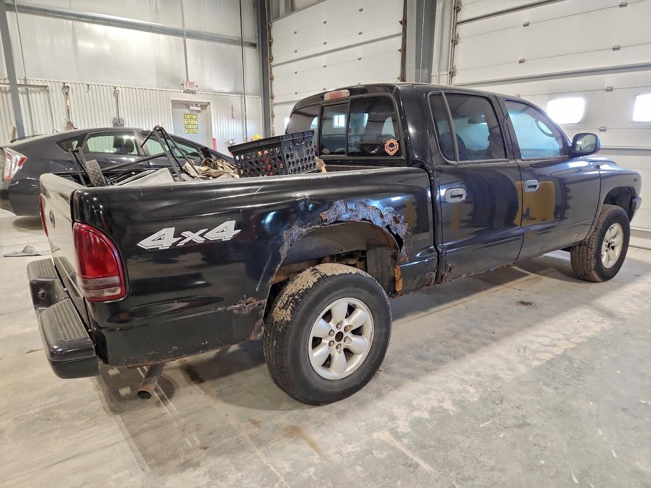 2004 DODGE DAKOTA QUAD SPORT photo 3