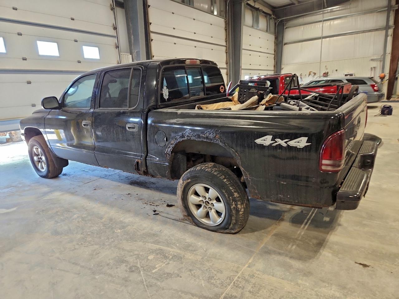 2004 DODGE DAKOTA QUAD SPORT photo 2
