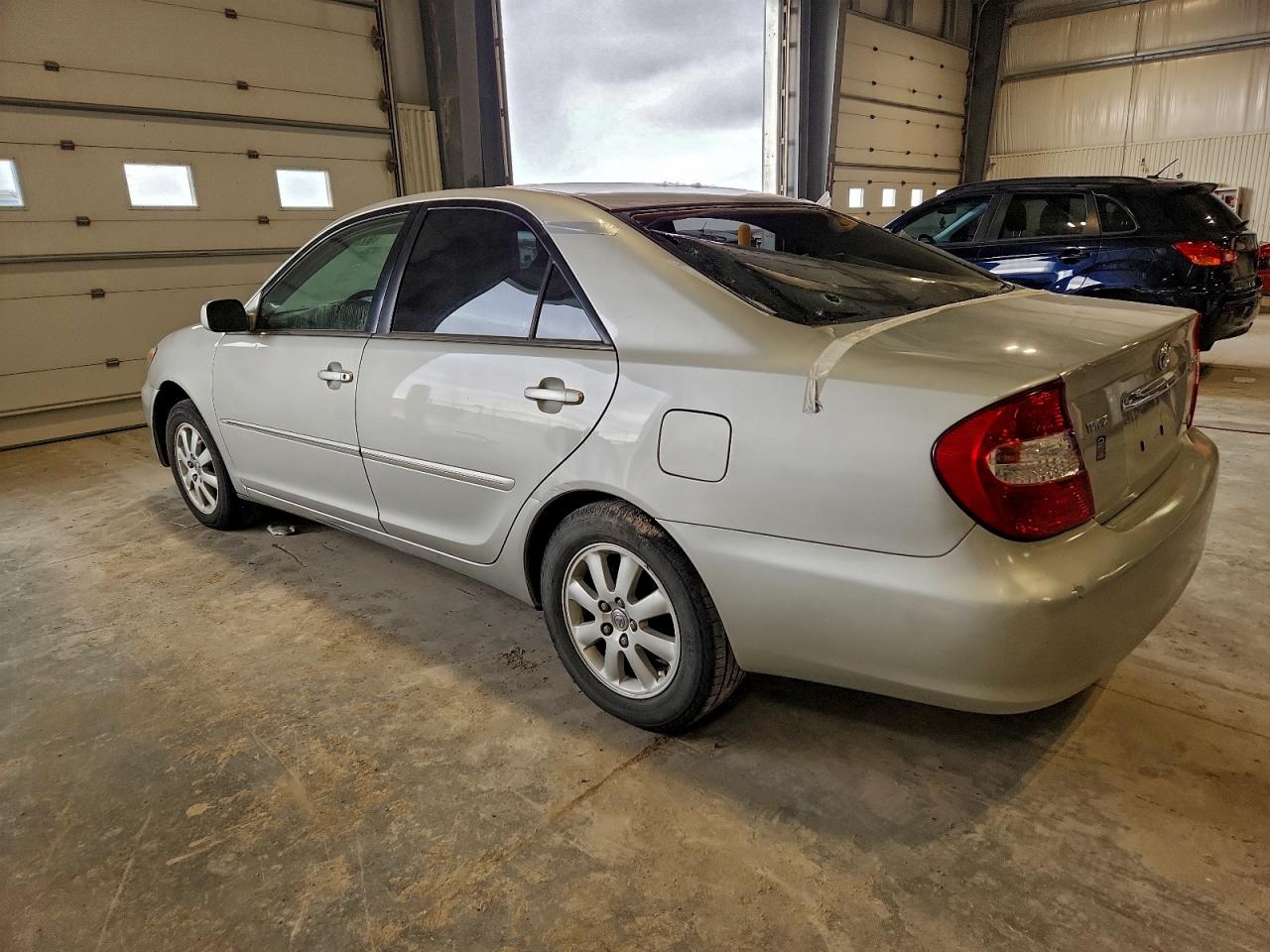 2004 TOYOTA CAMRY LE photo 4