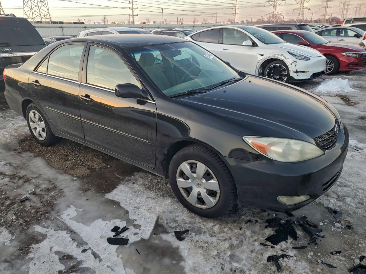 2004 TOYOTA CAMRY LE photo 4