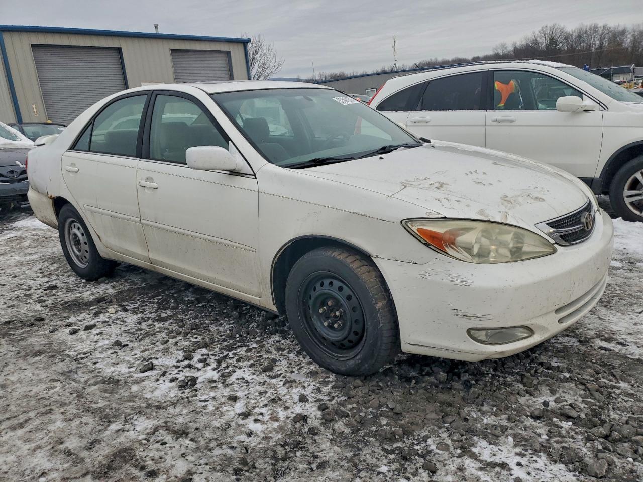 2004 TOYOTA CAMRY LE photo 4