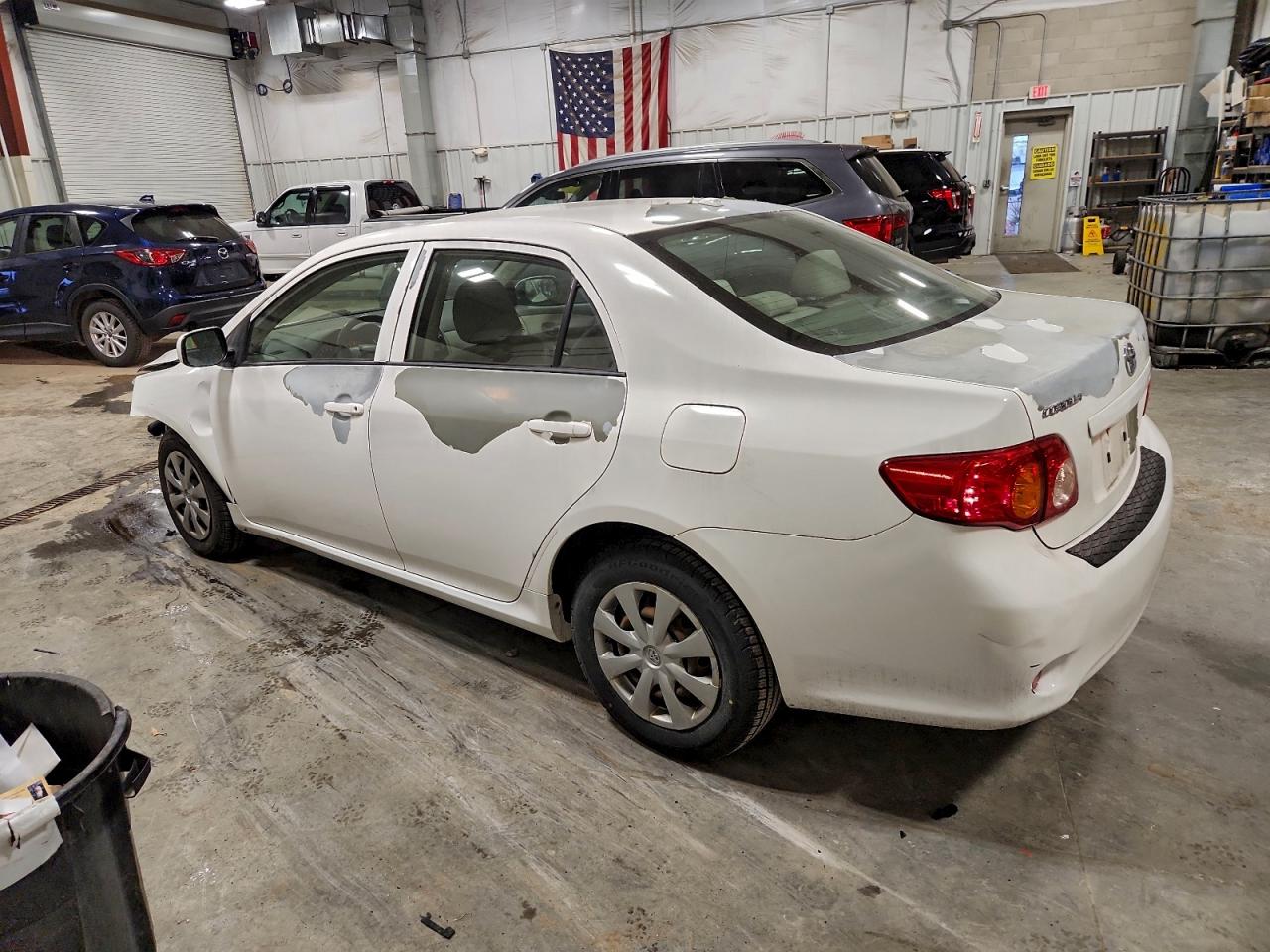 2010 TOYOTA COROLLA BASE photo 2